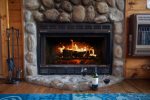 Enjoy a glass of wine in front of the wood burning fireplace